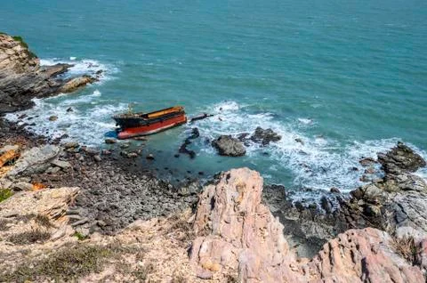 Boat stranded on the beach Stock Photos