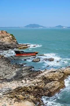 Boat stranded on the beach Stock Photos