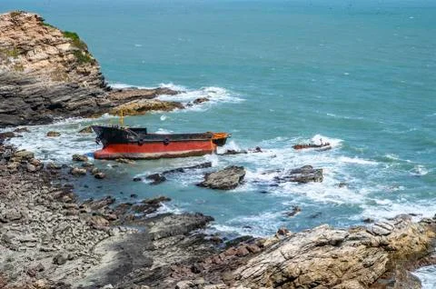 Boat stranded on the beach Stock Photos