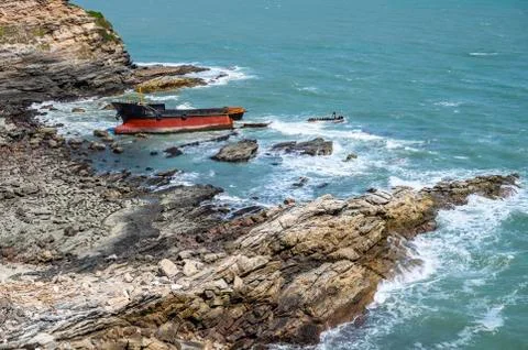 Boat stranded on the beach Stock Photos