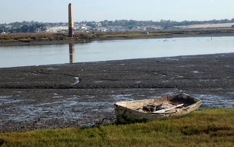 Boat stranded on the shore Stock Photos