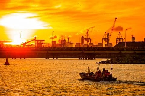 Boat at sunrise Stock Photos