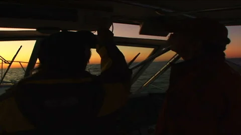 Boat in sunset in Atlantic Ocean Stock Footage 888770