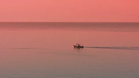Boat at sunset Stock Footage 106453388