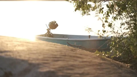 A boat at sunset Stock Footage 136179270