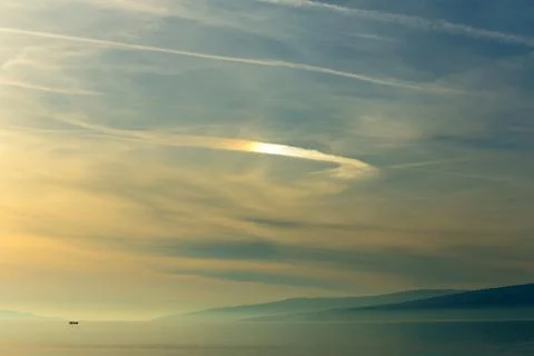 Boat at sunset Stock Photos