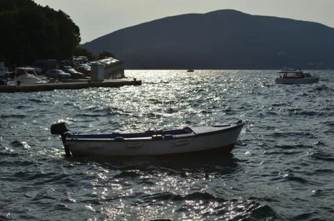 Boat in sunset Stock Photos