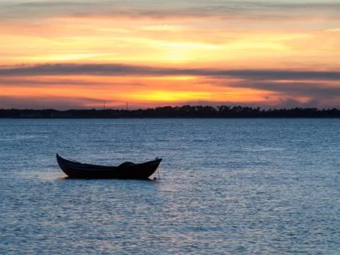 Boat at sunset Foto stock