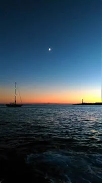 Boat at sunset Stock Photos