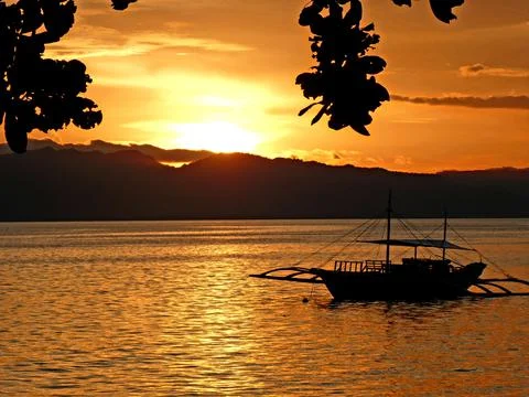 Boat sunset Stock Photos