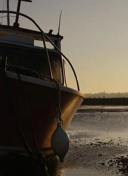 Boat at sunset Stock Photos