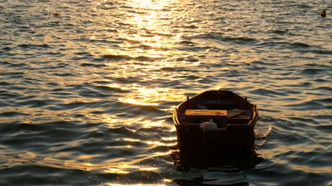 Boat at sunset on a sunny path Stock Footage 263258829