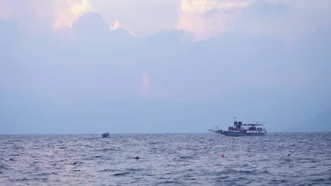 Boat at Sunset with Volcano, Lake Atitlan, Panajachel, Guatemala, Slow Motion 05 Stock Footage 125047611