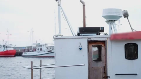 Boat sways on the waves in slow motion in docks, pier in the port, 4k 60p Stock Footage 165953043