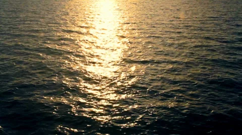 Boat through the waves during sunset Stock Footage 35755035