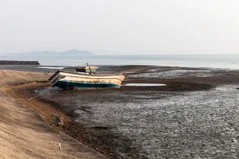 Boat in the tidal flat Stock Photos