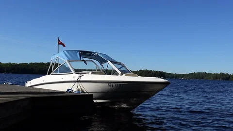A Boat tied to a dock Stock Footage 92039300