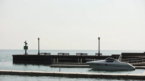 Boat tied up at a Dock Stock Footage 94005353
