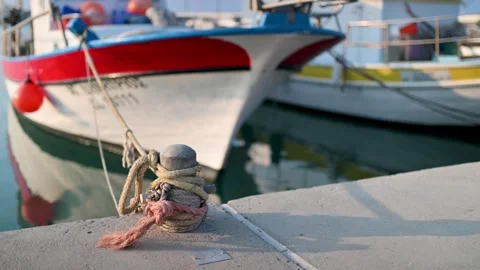 Boat tied to the pier Stock Footage 247695727