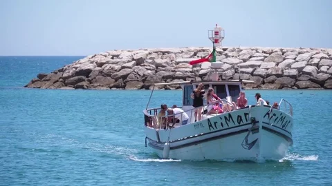 Boat with tourists on board for sightseeing Stock Footage 78583181