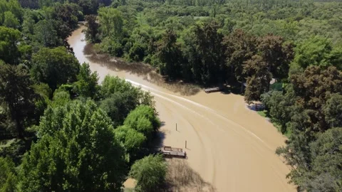 Boat Tracking over small river in South America Stock Footage 149282566