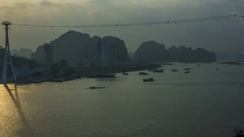 Boat traffic Ha Long Bay, Vietnam 4k Timelapse Early Morning light Stock Footage 136980296
