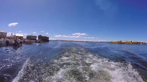 Boat trail on a sunny cloudless day. White foam, clear blue sky. Stock Footage 100338137