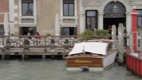 Boat trip with view of passing gondolas and houses Stock Footage 79824238