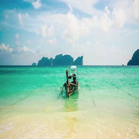 Boat on a tropical beach Stock Footage 69280551