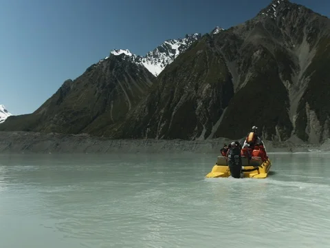Boat Turning in Alpine Lake Stock Footage 83526069