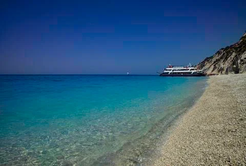 Boat on the turquoise sea at Lefkada Stock Photos
