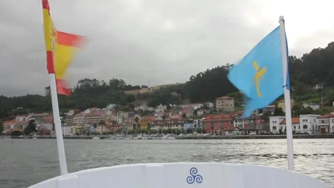 Boat with two banners, from Spain and from Asturias Stock Footage 315189072
