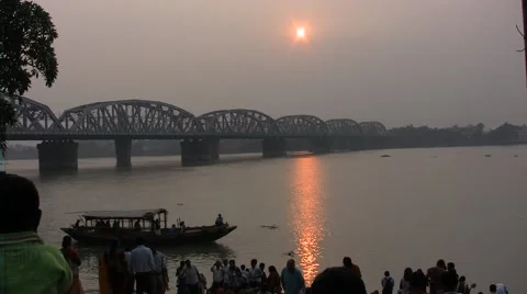 Boat under the bridge at sunset india Video stock 52064908