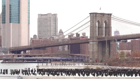 Boat under Brooklyn Bridge Stock Footage 83712077