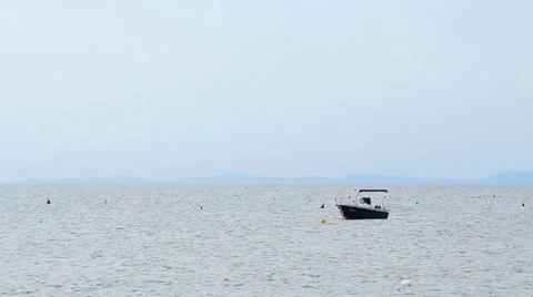 Boat under a misty sky Stock Footage 33241194