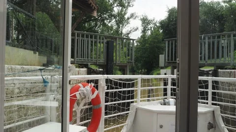 Boat waiting at the lock on the river Baise condom france 4k Stock Footage 157807640