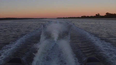 Boat wake from aft at dusk Stock Footage 24410041