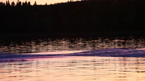 Boat wake at sunset Stock Footage 51713634