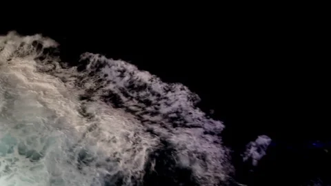 Boat wake, white crested waves during moonlit night open sea sailing Stock Footage 311452377