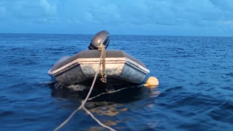 A boat on water with rope Stock-Footage 79559475