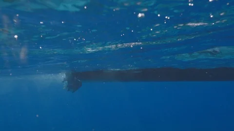 Boat on water surface underwater view Video stock 92496535