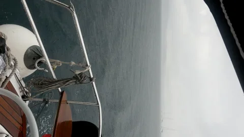 A boat is on the water with a view of the ocean Stock Footage 274032002