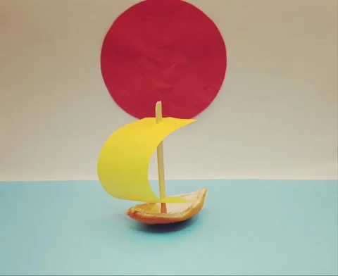A boat on the waves and the flag of Japan Stock Footage 335082799