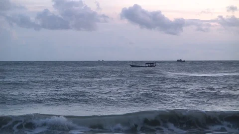 Boat on the waves and sky Stock Footage 114486675