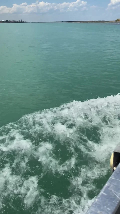 Boat waves on azure water Stock Footage 251919367