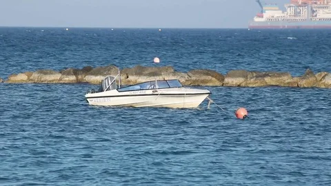 A boat on waves Stock Footage 76968671