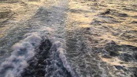 Boat waves at the sunset Stockbeeldmateriaal 137922665