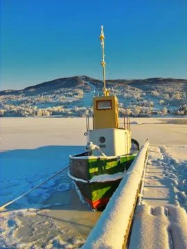 Boat in winter Stock Photos