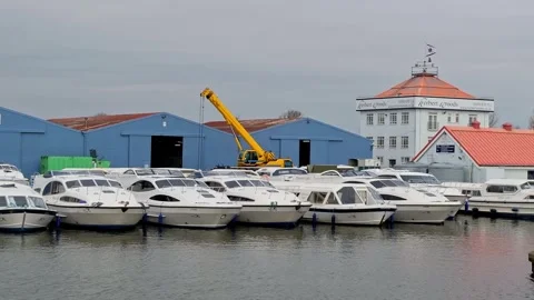 Boat yard and the infamous Herbert Woods tower, Potter Heigham Video stock 305338174