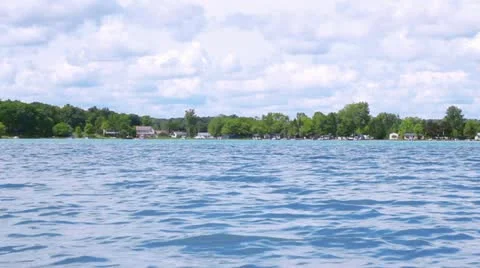 BoatAcrossLake Stock Footage 11637540